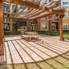 a covered patio  with a table