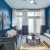 a living room with a blue wall