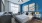 a bedroom with a bed and a fan