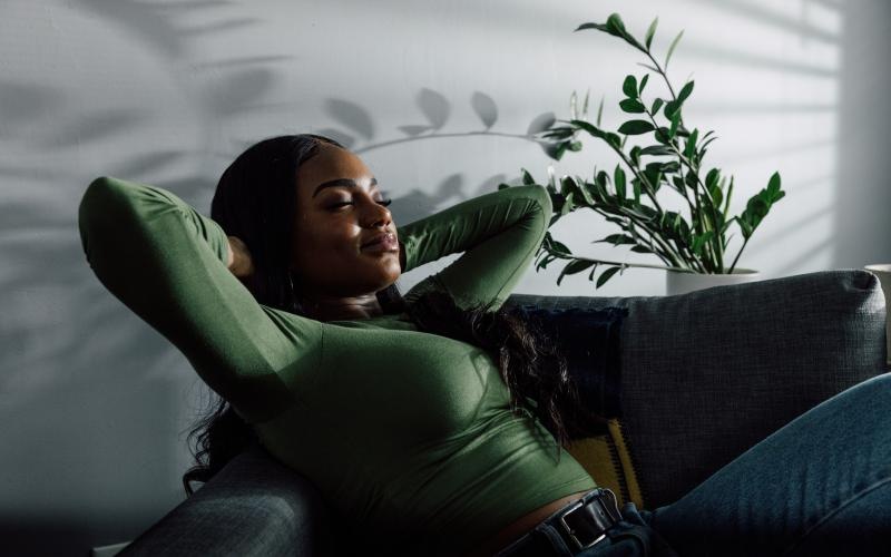 a woman sleeping on a couch